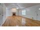Bright living room with hardwood floors, fireplace, and wainscoting at 476 Cody Ln, Douglasville, GA 30134