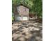 Charming two-story home with a spacious driveway and a welcoming front porch at 5389 Martins Crossing Rd, Stone Mountain, GA 30088