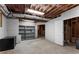Unfinished basement with metal shelving and exposed ceiling, ready for customization at 2026 Cresthaven Walk, Woodstock, GA 30189
