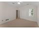Neutral bedroom with plush carpeting, including a closet and access to other rooms at 2026 Cresthaven Walk, Woodstock, GA 30189