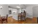 Modern kitchen with stainless appliances, white cabinetry, and granite countertops at 2026 Cresthaven Walk, Woodstock, GA 30189