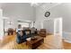 Spacious living room with high ceilings, hardwood floors, an open floor plan, and lots of natural light at 2026 Cresthaven Walk, Woodstock, GA 30189