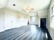 Spacious attic space featuring bright white walls and gray flooring at 238 Marks Rd, Mansfield, GA 30055