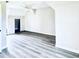 Spacious attic space featuring bright white walls and gray flooring at 238 Marks Rd, Mansfield, GA 30055