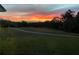 Exterior view of yard at sunset at 238 Marks Rd, Mansfield, GA 30055