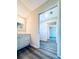 Bright bathroom with tiled floor and neutral walls at 238 Marks Rd, Mansfield, GA 30055