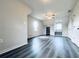 Spacious bedroom with gray floors, neutral walls and natural light at 238 Marks Rd, Mansfield, GA 30055