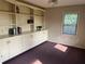 Cozy home office with built-in shelving and natural light at 238 Marks Rd, Mansfield, GA 30055