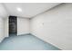 Unfinished basement with painted concrete walls and floors offers flexible space at 2771 Smithsonia Way, Tucker, GA 30084
