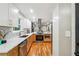 Spacious kitchen boasts modern appliances, ample counter space, and seamless flow to living spaces at 2771 Smithsonia Way, Tucker, GA 30084