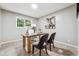 Comfortable office space features neutral tones, a large window, and ample natural light at 2771 Smithsonia Way, Tucker, GA 30084