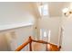 Grand foyer with hardwood floors, soaring ceilings, a front door with glass, and an adjacent staircase at 410 Hendon Rd, Woodstock, GA 30188