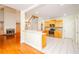 Bright kitchen with wooden cabinets, white countertops, and stainless steel appliances at 410 Hendon Rd, Woodstock, GA 30188