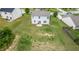 Aerial view of a large backyard with a house and some trees at 8553 Braylen Manor Dr, Douglasville, GA 30134