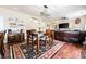 Open-concept living space featuring a dining area, living room, and seamless flow for entertaining guests at 8553 Braylen Manor Dr, Douglasville, GA 30134