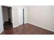 Neutral bedroom with closet space and new floor at 10074 Tara Glynn Dr, Hampton, GA 30228