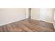 Spacious bedroom with wood flooring and two doors at 10074 Tara Glynn Dr, Hampton, GA 30228