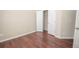 Neutral bedroom showing closet and door at 10074 Tara Glynn Dr, Hampton, GA 30228