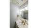 Well-lit bathroom featuring a large mirror, updated fixtures, and a clean, modern design at 10900 Wittenridge Dr # C7, Alpharetta, GA 30022