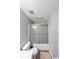 Clean bathroom featuring a shower with glass doors and neutral tones, offering a refreshing and functional space at 10900 Wittenridge Dr # C7, Alpharetta, GA 30022