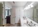 Bathroom with a double sink vanity, large mirror, and neutral decor, creating a relaxing atmosphere at 10900 Wittenridge Dr # C7, Alpharetta, GA 30022