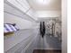 Organized walk-in closet with ample shelving and storage space, providing functionality and convenience at 10900 Wittenridge Dr # C7, Alpharetta, GA 30022