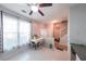 Bright dining area with natural light, tile floors, and an adjacent staircase at 10900 Wittenridge Dr # C7, Alpharetta, GA 30022