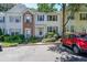 Charming townhome with light siding, blue shutters, and well-maintained landscaping at 10900 Wittenridge Dr # C7, Alpharetta, GA 30022
