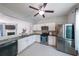 Bright kitchen with granite countertops, stainless steel appliances, and an open layout at 10900 Wittenridge Dr # C7, Alpharetta, GA 30022