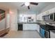 Spacious kitchen featuring modern appliances and plenty of countertop space for cooking at 10900 Wittenridge Dr # C7, Alpharetta, GA 30022