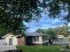 A spacious backyard featuring a partially covered pool and renovated siding for added value at 1321 Earle Se Ct, Conyers, GA 30013