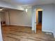 Well-lit bedroom boasts wood flooring and neutral walls, creating a soothing atmosphere at 1321 Earle Se Ct, Conyers, GA 30013
