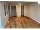 Bedroom with two closets, a bright window and laminate wood flooring for easy upkeep at 1321 Earle Se Ct, Conyers, GA 30013