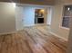 Bright, airy bedroom leading to updated bathroom, complete with sleek laminate flooring and freshly painted walls at 1321 Earle Se Ct, Conyers, GA 30013