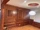 Exquisite dining room with custom wainscoting, detailed molding, and hardwood floors at 1321 Earle Se Ct, Conyers, GA 30013