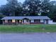 Charming single-story home with brick and stone accents, lush lawn, and inviting curb appeal at 1321 Earle Se Ct, Conyers, GA 30013