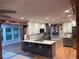 Modern kitchen featuring stainless steel appliances, granite counters, and updated cabinets at 1321 Earle Se Ct, Conyers, GA 30013