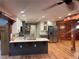 Beautiful, well-equipped kitchen with an island, granite countertops, and stainless steel appliances at 1321 Earle Se Ct, Conyers, GA 30013