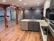 Spacious kitchen features granite countertops, stainless steel appliances, and hardwood flooring at 1321 Earle Se Ct, Conyers, GA 30013