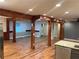 Spacious open-concept layout with hardwood floors, grand columns, and modern finishes, perfect for entertaining at 1321 Earle Se Ct, Conyers, GA 30013