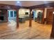Bright living space featuring hardwood floors, a fireplace, open kitchen with stainless appliances at 1321 Earle Se Ct, Conyers, GA 30013