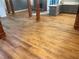 Spacious living room features hardwood floors, a stone fireplace, and an open layout at 1321 Earle Se Ct, Conyers, GA 30013