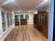 Bright and airy sunroom with lots of windows, showcasing hardwood floors and vintage furniture at 1321 Earle Se Ct, Conyers, GA 30013