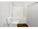 Bright bathroom featuring a white toilet and tub-shower combination with subway tile surround at 25 Timber Ridge Dr, Cartersville, GA 30121