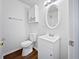 Clean bathroom featuring a toilet, sink, vanity cabinet and medicine cabinet at 25 Timber Ridge Dr, Cartersville, GA 30121
