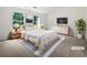 Cozy bedroom with natural light, neutral colors, and modern furnishings at 25 Timber Ridge Dr, Cartersville, GA 30121