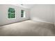 Bright bedroom with carpet flooring, natural lighting, and spacious layout at 25 Timber Ridge Dr, Cartersville, GA 30121