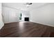 Spacious living room featuring a fireplace, updated flooring, and a bright window at 25 Timber Ridge Dr, Cartersville, GA 30121