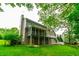 Spacious backyard featuring a multi-level deck and patio, perfect for outdoor entertaining at 3394 Floral Ct, Suwanee, GA 30024