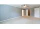 Bedroom featuring neutral walls, plush carpeting, and closet space at 3394 Floral Ct, Suwanee, GA 30024